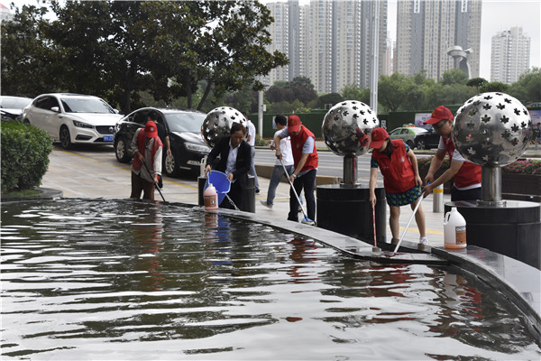 hth官方网页版-hth（中国）联合商务区社区开展“清洁家园 美化社区”       主题志愿服务活动